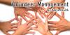 Seven hands criss-crossing each other